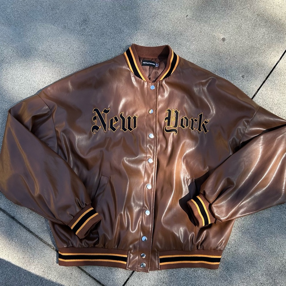 PrettyLittleThing Brown Faux Leather Varsity Jacket with Black & Gold Trim